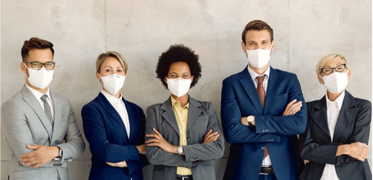 coworkers wearing face masks